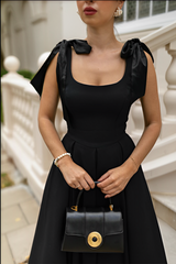 Chic Enchantress Black Midi Dress